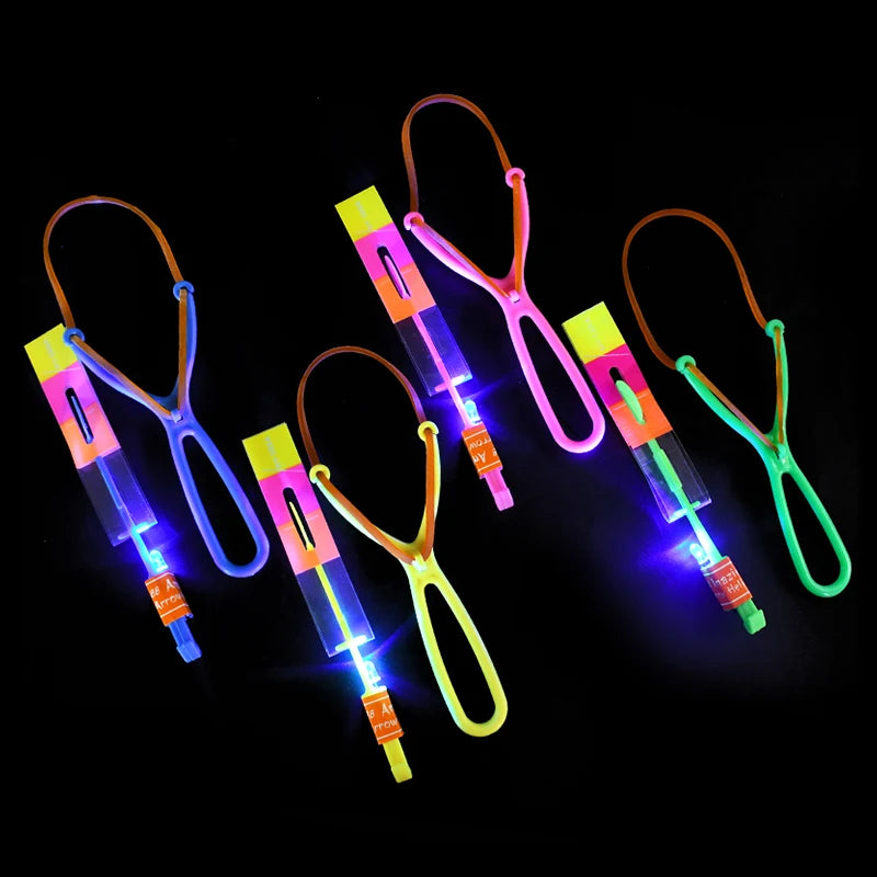 5/20/50Pcs Kid LED Light Arrow Rocket Helicopter Flying Toys